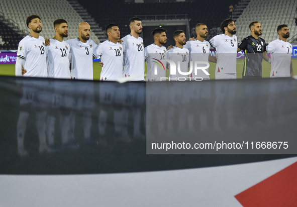 Palestine players stand for their national anthem before the FIFA World Cup 2026 Qualification 3rd Round group B match between Palestine and...