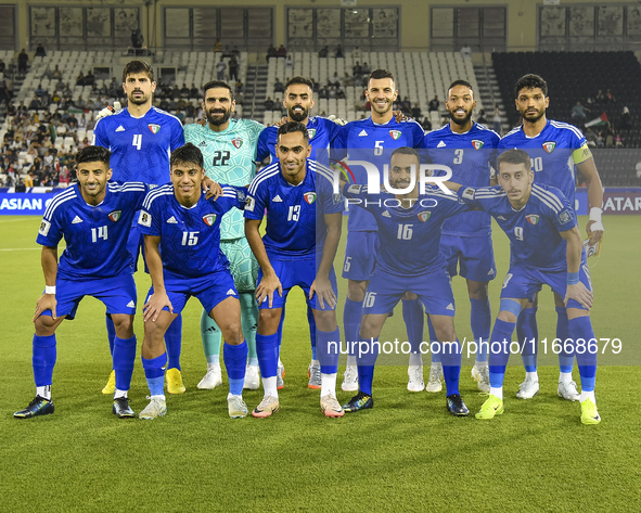 Kuwait team players pose for a team photo before the FIFA World Cup 2026 Qualification 3rd Round group B match between Palestine and Kuwait...