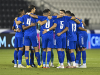 Players of Kuwait stand before the FIFA World Cup 2026 Qualification 3rd Round group B match between Palestine and Kuwait at Jassim Bin Hama...