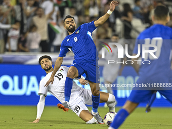 Wessam Abouli of Palestine competes for the ball with Ahmad Aldhefiri of Kuwait during the FIFA World Cup 2026 Qualification 3rd Round group...