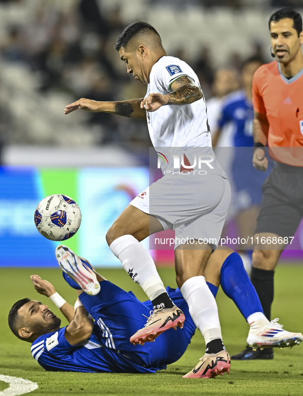 Jonathan Zorrilla of Palestine competes for the ball with Fahad Alhajeri of Kuwait during the FIFA World Cup 2026 Qualification 3rd Round gr...