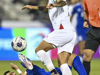 Jonathan Zorrilla of Palestine competes for the ball with Fahad Alhajeri of Kuwait during the FIFA World Cup 2026 Qualification 3rd Round gr...