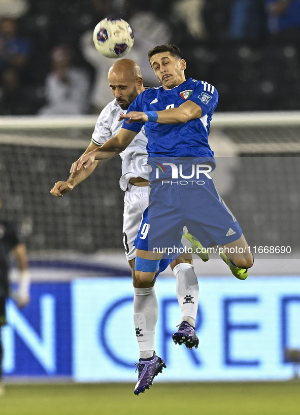 Mohammed Rashid (L) of Palestine battles for the ball with Salman Mohammed of Kuwait during the FIFA World Cup 2026 Qualification 3rd Round...