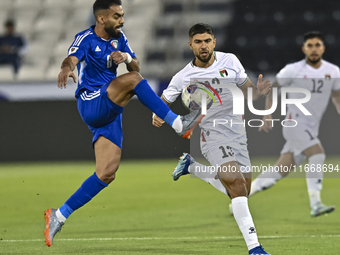 Omar Faraj of Palestine competes for the ball with Rashed Aldousari of Kuwait during the FIFA World Cup 2026 Qualification 3rd Round group B...