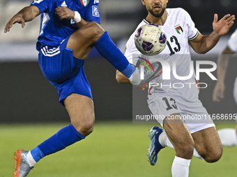 Omar Faraj of Palestine competes for the ball with Rashed Aldousari of Kuwait during the FIFA World Cup 2026 Qualification 3rd Round group B...