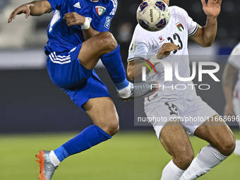 Omar Faraj of Palestine competes for the ball with Rashed Aldousari of Kuwait during the FIFA World Cup 2026 Qualification 3rd Round group B...