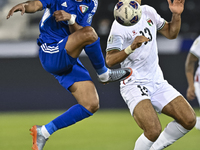 Omar Faraj of Palestine competes for the ball with Rashed Aldousari of Kuwait during the FIFA World Cup 2026 Qualification 3rd Round group B...