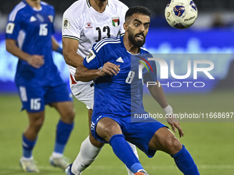 Omar Faraj of Palestine battles for the ball with Rashed Aldousari of Kuwait during the FIFA World Cup 2026 Qualification 3rd Round group B...