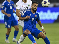 Omar Faraj of Palestine battles for the ball with Rashed Aldousari of Kuwait during the FIFA World Cup 2026 Qualification 3rd Round group B...