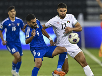 Omar Faraj of Palestine competes for the ball with Rashed Aldousari of Kuwait during the FIFA World Cup 2026 Qualification 3rd Round group B...