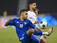 Omar Faraj of Palestine competes for the ball with Rashed Aldousari of Kuwait during the FIFA World Cup 2026 Qualification 3rd Round group B...