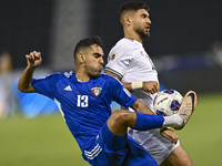 Omar Faraj of Palestine competes for the ball with Rashed Aldousari of Kuwait during the FIFA World Cup 2026 Qualification 3rd Round group B...