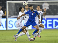 Jonathan Zorrilla of Palestine battles for the ball with Ahmad Aldhefiri of Kuwait during the FIFA World Cup 2026 Qualification 3rd Round gr...