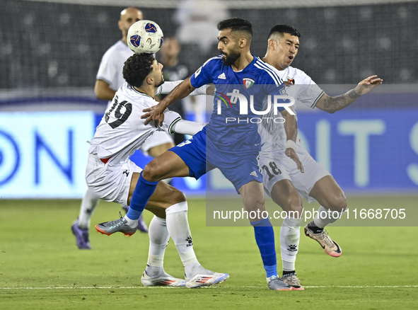 Jonathan Zorrilla of Palestine battles for the ball with Ahmad Aldhefiri of Kuwait during the FIFA World Cup 2026 Qualification 3rd Round gr...