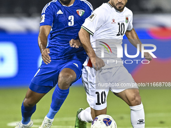 Mahmoud Abuwarda of Palestine battles for the ball with Meshari Alenezi of Kuwait during the FIFA World Cup 2026 Qualification 3rd Round gro...