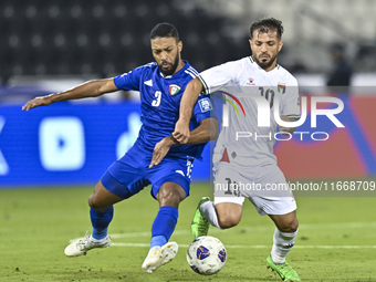 Mahmoud Abuwarda of Palestine battles for the ball with Meshari Alenezi of Kuwait during the FIFA World Cup 2026 Qualification 3rd Round gro...