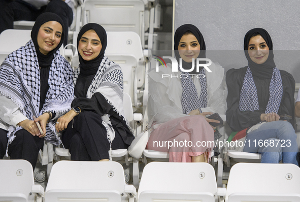 Palestine fans pose inside the stadium before the FIFA World Cup 2026 Asian Qualifiers third round group B match between Palestine and Kuwai...