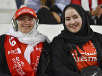 Palestine fans pose inside the stadium before the FIFA World Cup 2026 Asian Qualifiers third round group B match between Palestine and Kuwai...