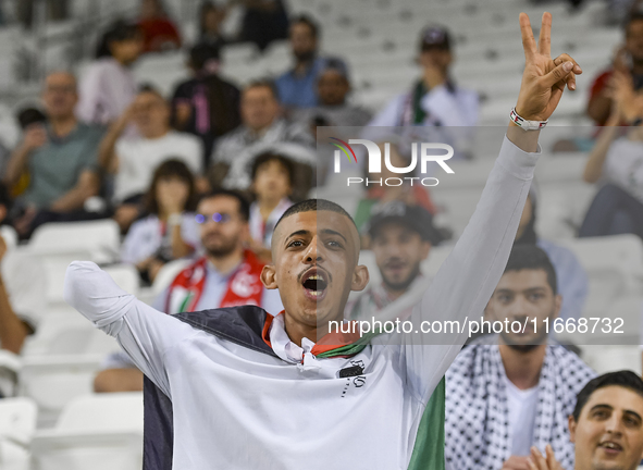 Evacuees from Gaza cheer for the Palestine national team during the FIFA World Cup 2026 Asian Qualifiers third round group B match between P...