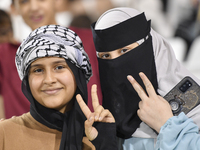 Evacuees from Gaza cheer for the Palestine national team during the FIFA World Cup 2026 Asian Qualifiers third round group B match between P...