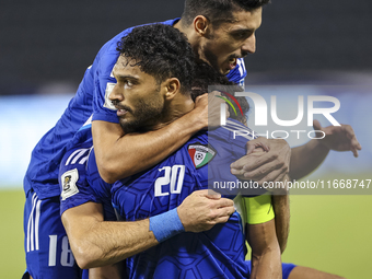 Yousef Alsulaiman (C) of Kuwait celebrates after scoring a goal during the FIFA World Cup 2026 Qualification 3rd Round group B match between...