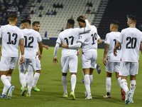 Wessam Abouli (3-R) of Palestine celebrates with his teammates after scoring a goal during the FIFA World Cup 2026 Qualification 3rd Round g...