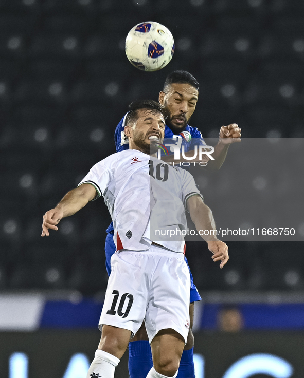 Mahmoud Abuwarda of Palestine battles for the ball with Meshari Alenezi of Kuwait during the FIFA World Cup 2026 Qualification 3rd Round gro...