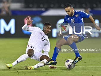 Mousa Farawi of Palestine battles for the ball with Moaath Alenezi of Kuwait during the FIFA World Cup 2026 Qualification 3rd Round group B...