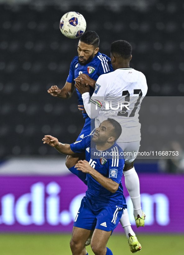 Mousa Farawi (C) of Palestine battles for the ball with Fahad Alhajeri of Kuwait during the FIFA World Cup 2026 Qualification 3rd Round grou...