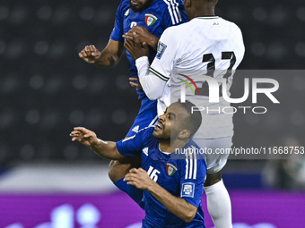 Mousa Farawi (C) of Palestine battles for the ball with Fahad Alhajeri of Kuwait during the FIFA World Cup 2026 Qualification 3rd Round grou...