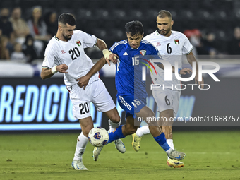 Ameed Mahajneh of Palestine battles for the ball with Yosef Alshammari of Kuwait during the FIFA World Cup 2026 Qualification 3rd Round grou...