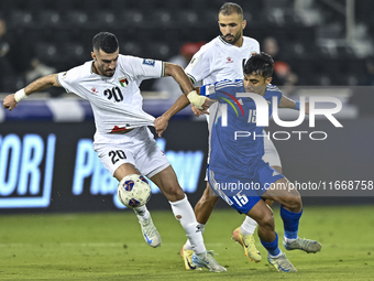 Ameed Mahajneh of Palestine battles for the ball with Yosef Alshammari of Kuwait during the FIFA World Cup 2026 Qualification 3rd Round grou...