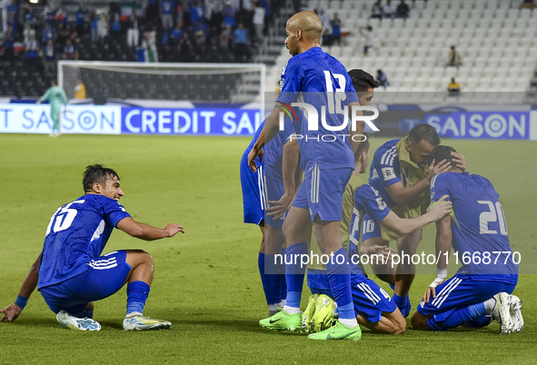 Yousef Alsulaiman (R) of Kuwait celebrates with his teammates after scoring a goal during the FIFA World Cup 2026 Qualification 3rd Round gr...