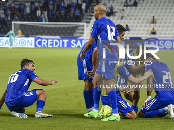 Yousef Alsulaiman (R) of Kuwait celebrates with his teammates after scoring a goal during the FIFA World Cup 2026 Qualification 3rd Round gr...