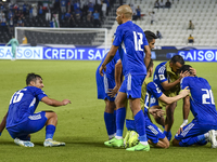 Yousef Alsulaiman (R) of Kuwait celebrates with his teammates after scoring a goal during the FIFA World Cup 2026 Qualification 3rd Round gr...