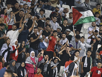 Fans of Palestine cheer during the FIFA World Cup 2026 Qualification 3rd Round group B match between Palestine and Kuwait at Jassim Bin Hama...