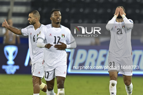 Zeid Qunbar of Palestine celebrates with his teammates after scoring a goal during the FIFA World Cup 2026 Qualification 3rd Round group B m...