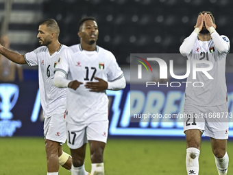 Zeid Qunbar of Palestine celebrates with his teammates after scoring a goal during the FIFA World Cup 2026 Qualification 3rd Round group B m...