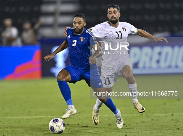 Oday Dabbagh of Palestine battles for the ball with Meshari Alenezi of Kuwait during the FIFA World Cup 2026 Qualification 3rd Round group B...