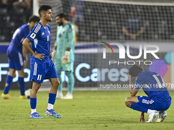 Players of Kuwait react after the FIFA World Cup 2026 Qualification 3rd Round group B match between Palestine and Kuwait at Jassim Bin Hamad...