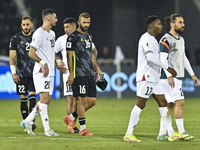 Players of Palestine react after the FIFA World Cup 2026 Qualification 3rd Round group B match between Palestine and Kuwait at Jassim Bin Ha...