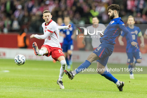 Sebastian Szymanski , Josko Gvardiol  during UEFA Nations League match Poland vs Croatia in Warsaw Poland on 15 October 2024. 