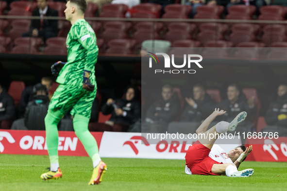 Dominik Livakovic , Robert Lewandowski  during UEFA Nations League match Poland vs Croatia in Warsaw Poland on 15 October 2024. 