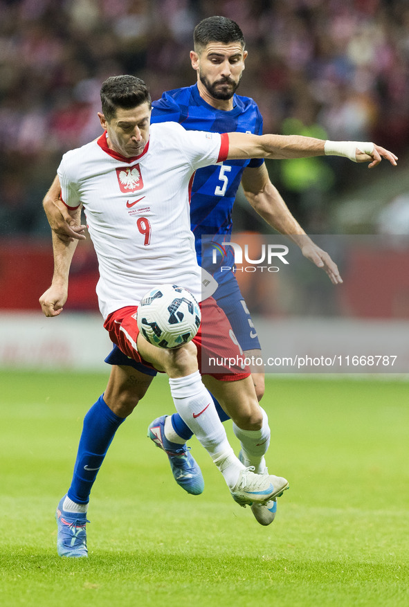 Robert Lewandowski , Martin Erlic  during UEFA Nations League match Poland vs Croatia in Warsaw Poland on 15 October 2024. 