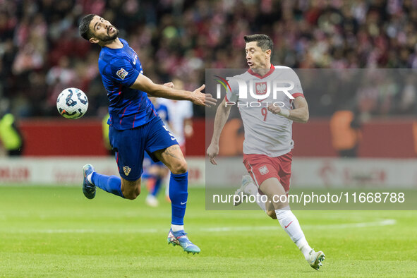 Martin Erlic , Robert Lewandowski  during UEFA Nations League match Poland vs Croatia in Warsaw Poland on 15 October 2024. 