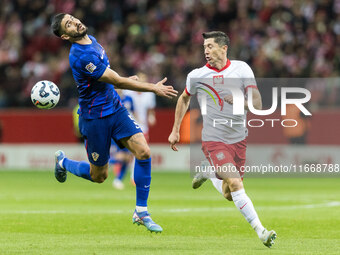 Martin Erlic , Robert Lewandowski  during UEFA Nations League match Poland vs Croatia in Warsaw Poland on 15 October 2024. (