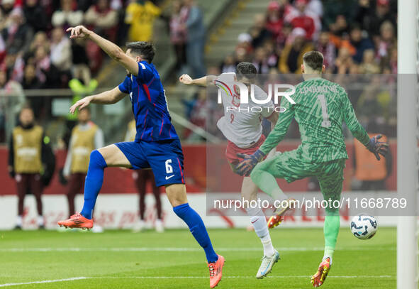 Josip Sutalo , Robert Lewandowski , Dominik Livakovic  during UEFA Nations League match Poland vs Croatia in Warsaw Poland on 15 October 202...