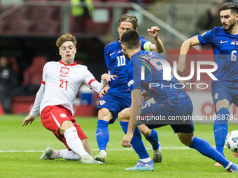 Nicola Zalewski , Luka Modric , Martin Erlic , Josip Sutalo  during UEFA Nations League match Poland vs Croatia in Warsaw Poland on 15 Octob...