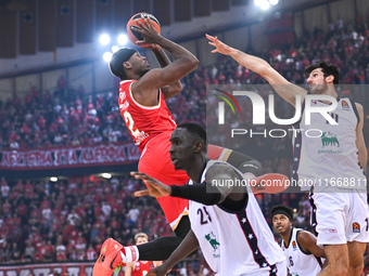 Moses Wright of Olympiacos Piraeus competes with Leandro Bolmaro of EA7 Emporio Armani Milan during the Euroleague, Round 3 match between Ol...