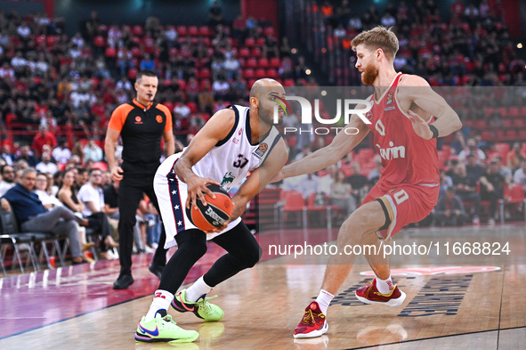 Shavon Shields of EA7 Emporio Armani Milan competes with Thomas Walkup of Olympiacos Piraeus during the Euroleague, Round 3 match between Ol...